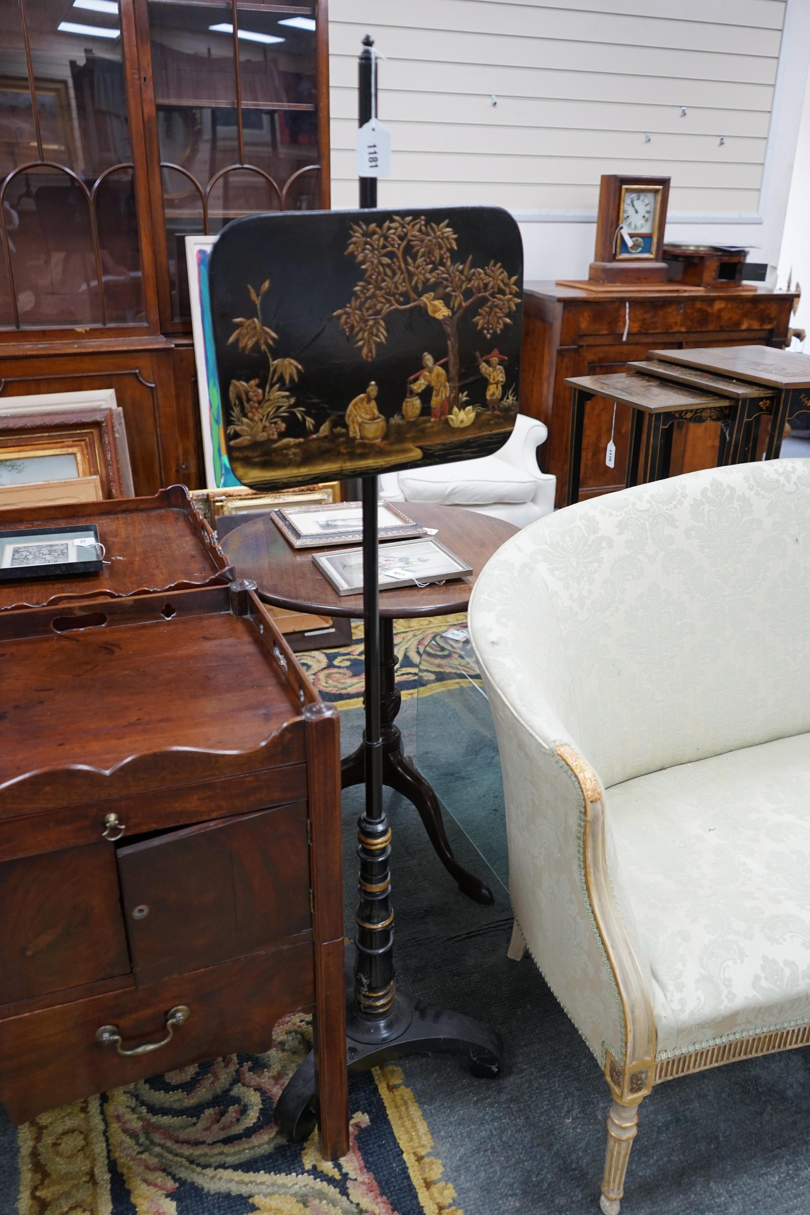 A pair of 19th century chinoiserie lacquer pole screens, height 152cm